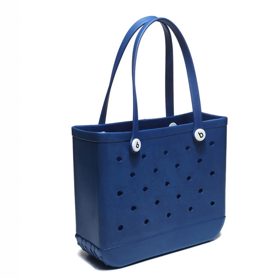 Beach bag with holes, hand-held, waterproof travel bag that can be washed, suitable for sports, beach, and swimming pool use.