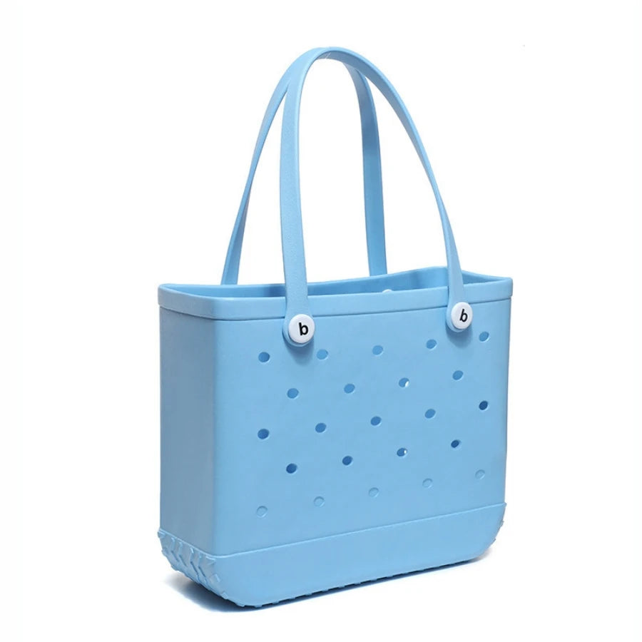 Beach bag with holes, hand-held, waterproof travel bag that can be washed, suitable for sports, beach, and swimming pool use.