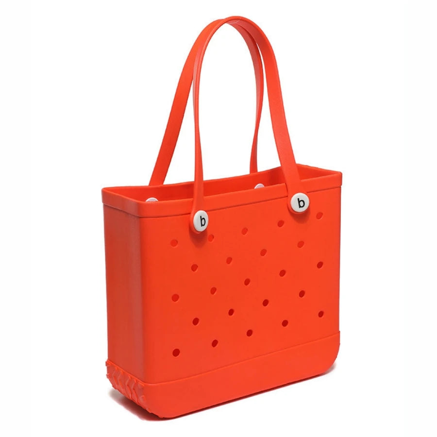 Beach bag with holes, hand-held, waterproof travel bag that can be washed, suitable for sports, beach, and swimming pool use.